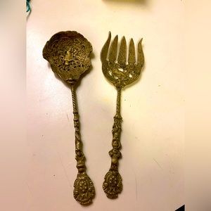 Brass serving set , with cherub on each